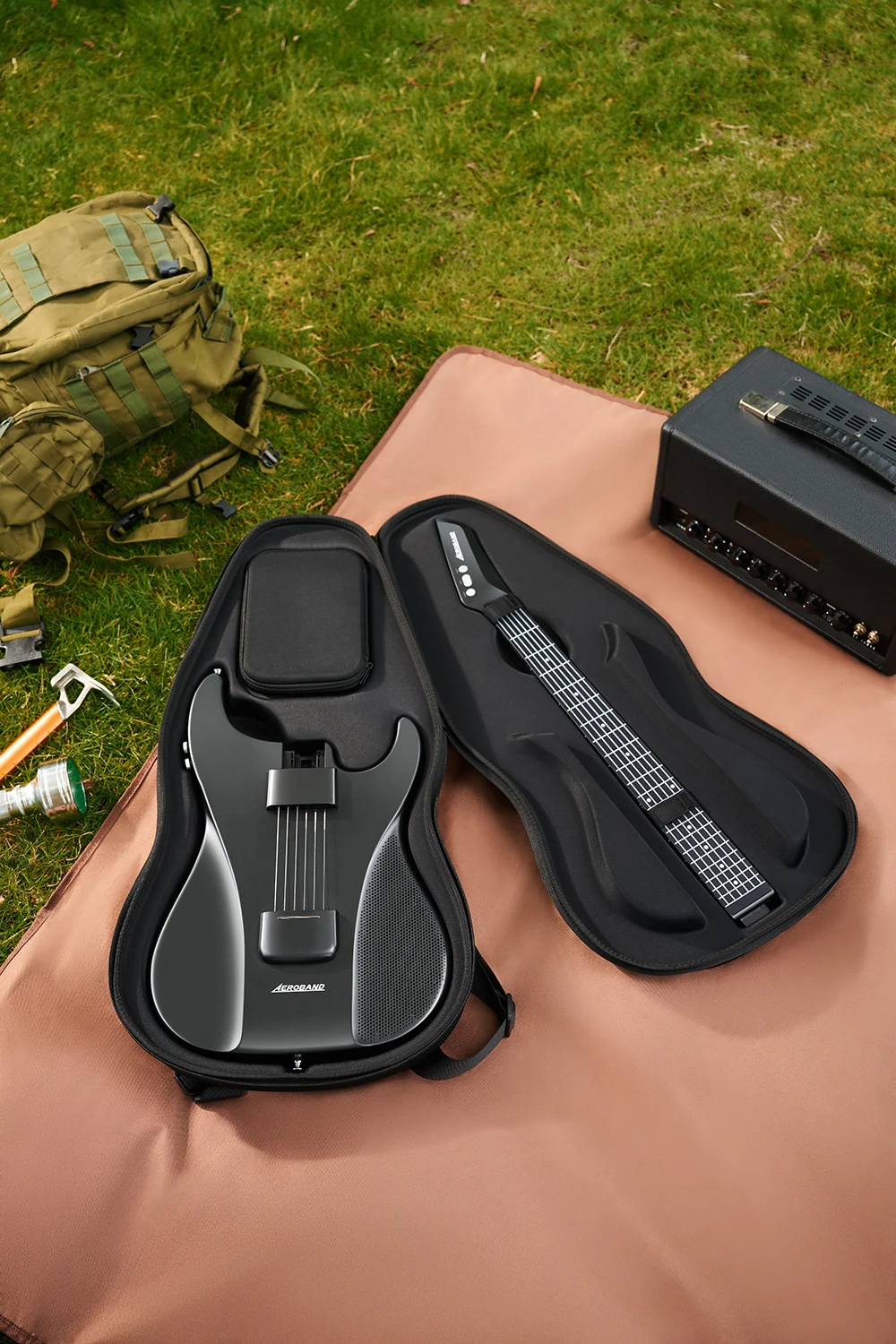 AeroBand Detachable Electric Guitar with Pain-Free Silicone Strings - 9 Sound Styles, Acoustic Bass Mic Port Included 30 kf Sfeb879a7de6b4865a22d4aa66dc30d73U